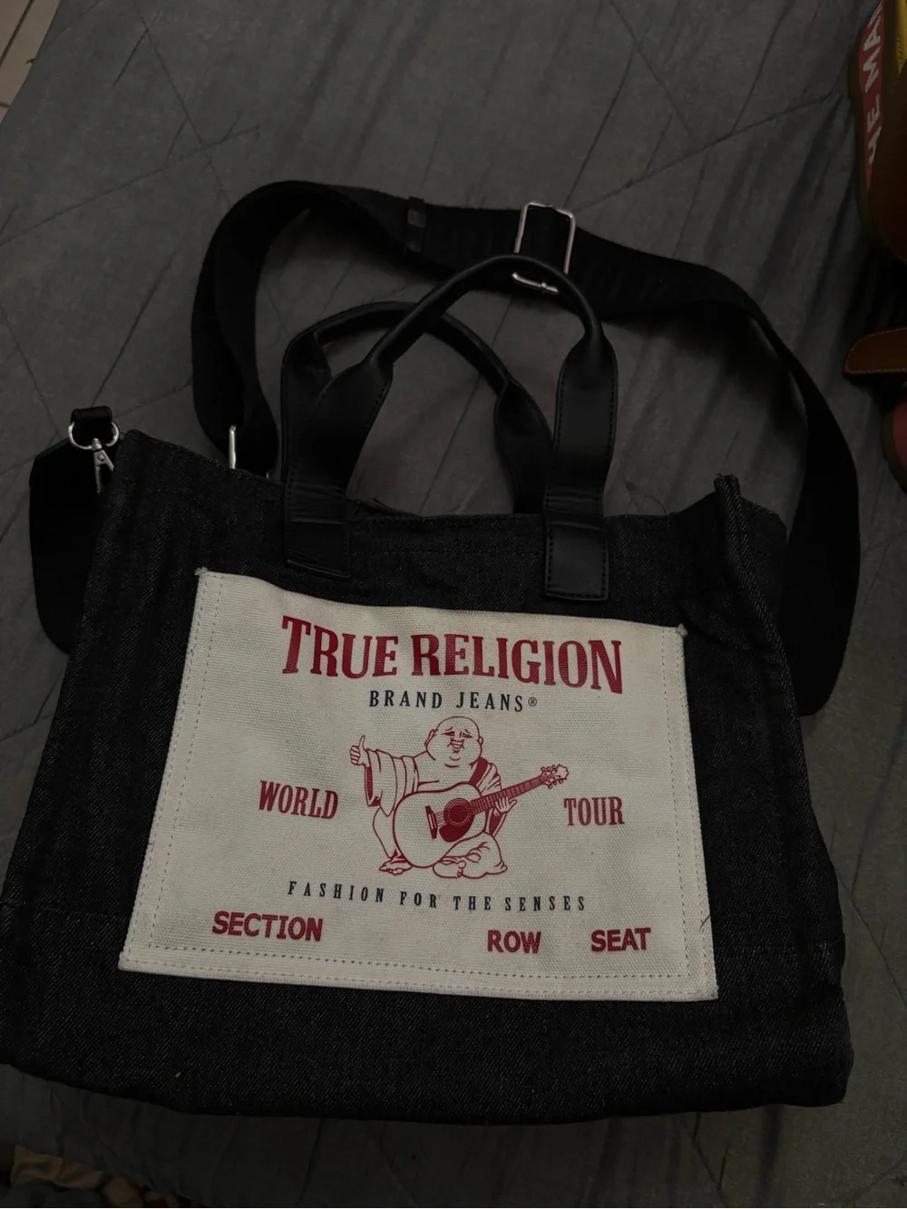 True Religion Black Canvas Messenger Tote with White Front Panel and Red Print